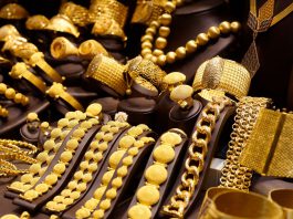 Gold Steadies Despite Rate Hike Headwinds, Set For Flat Week Financial News