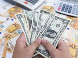 Dollar Droops Amid Improved Risk Mood Before Fed; Aussie Pares Gain After RBA DOLLAR DROPP