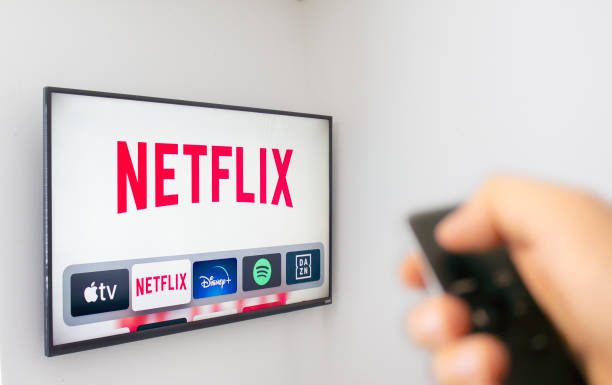 Netflix Restructures Film Group As it Scales Back Movie Output – Bloomberg News