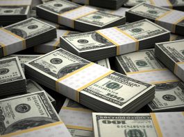 Dollar Edges Lower; Chinese Growth Data Boosts Risk Sentiment