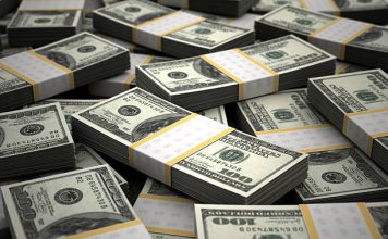 Dollar Edges Lower; Chinese Growth Data Boosts Risk Sentiment